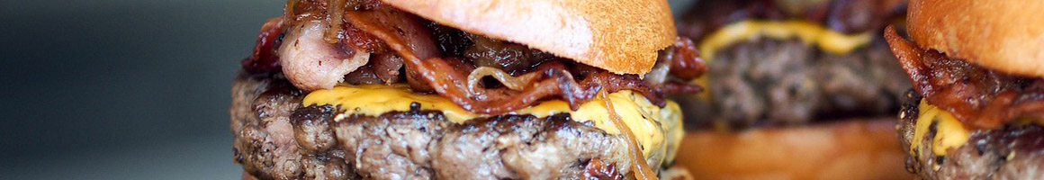 Eating American (Traditional) Burger at John's Cypress restaurant in Cypress, CA.